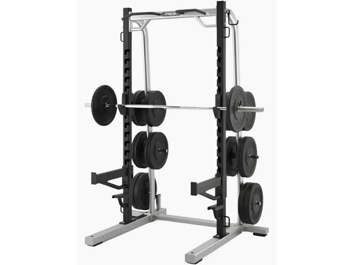 Manufacturer reference photo of a half rack loaded with a barbell and plates.