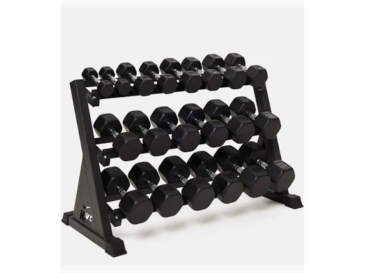 Rows of commercial dumbbells in a premium gym setting, representing equipment planned for Q Fitness.